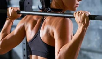 a woman lifting weights