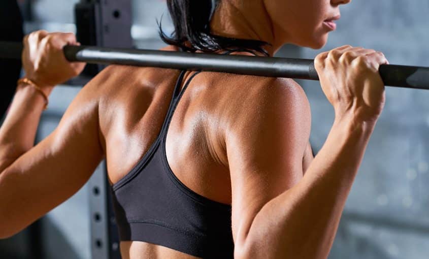 a woman lifting weights